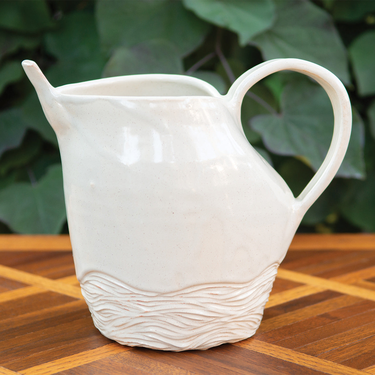 Creamy Carved Base Pitcher