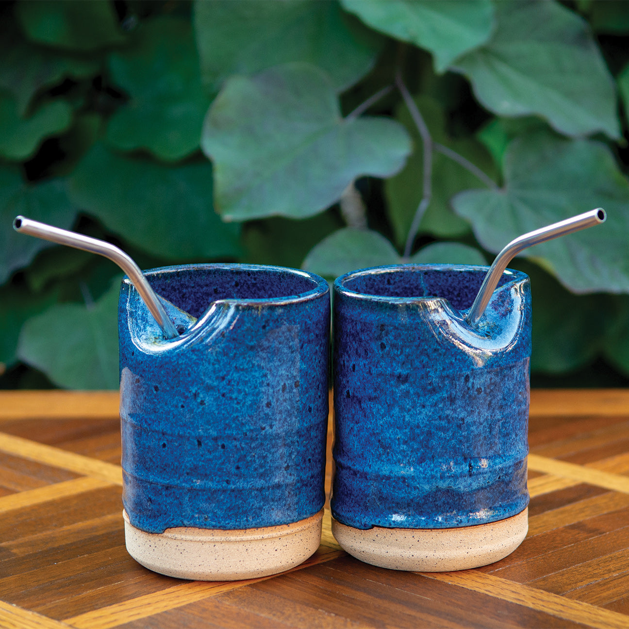 Ribbed Straw Cups on Sandy Clay in Denim